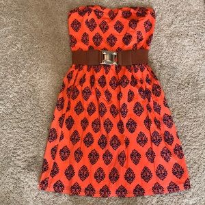 Cute orange dress with navy designs!